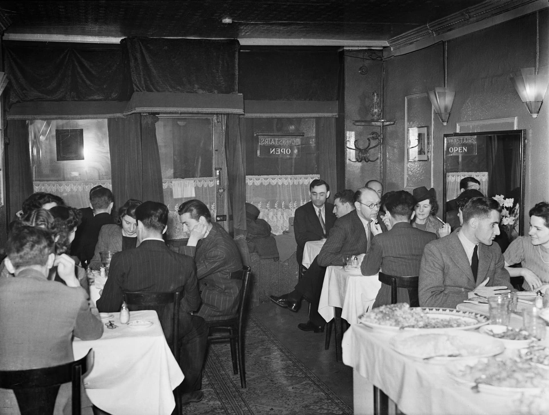 Customers enjoy a meal in the very busy Istanbul restaurant at number 12 Frith Street, Soho, London, 1943. D13592